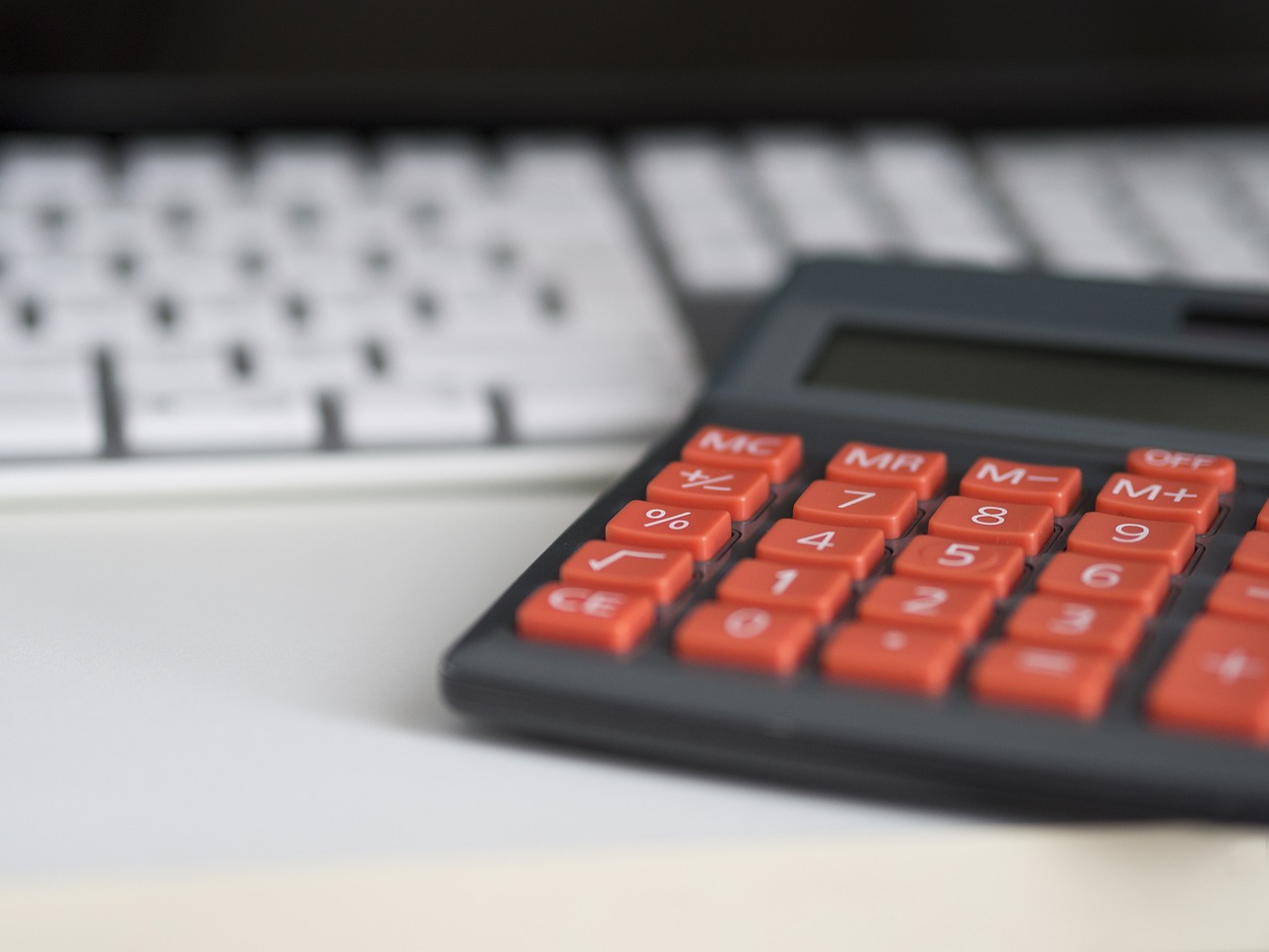 keyboard behind a calculator